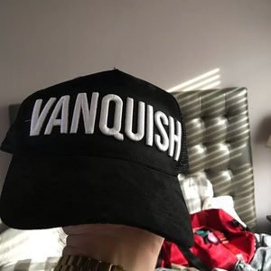 Black Vanquish velvet trucker hat.
